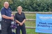 David Cobb of Cobbs Country Store with PC Karen IRving from the Rural Crime Action Team. Photo: Lincolnshire Police