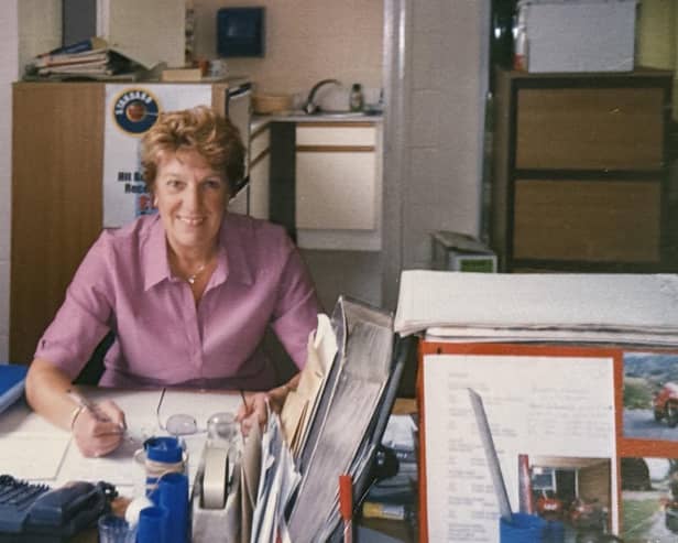 Marian Richardson at her desk at the Boston Standard, where she worked for 18 years.