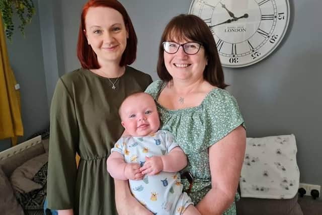 Angela with Sadie-Marie and baby Teddy.