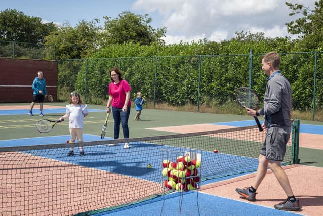 Emily Raithby-Veall, 6, with her mum and coach Karl Sutton.