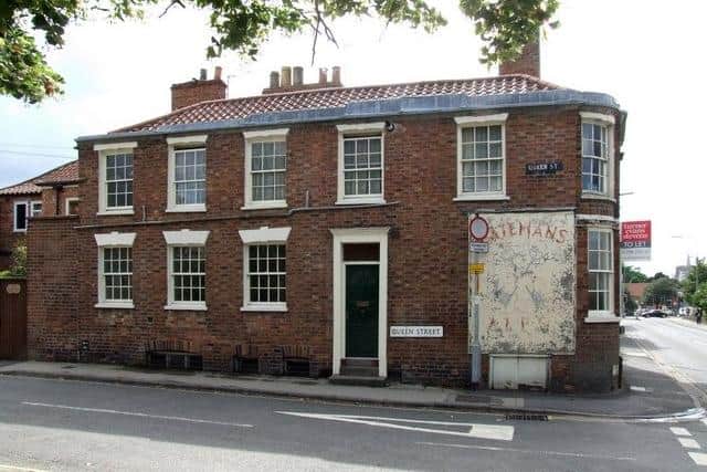 The 'ghost sign', advertising Batemans Ales, on the walls of the former Cross Keys pub on Queen Street in Horncastle. (PHOTO BY: Dave Hitchborne)