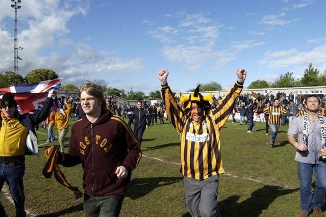 United are champions and the pitch invasion begins!