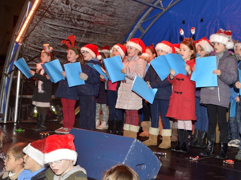 Pupils from St Michael’s CofE Primary School, in Louth, singing a selection of Christmas carols ahead of the town's Christmas lights switch-on in 2014.