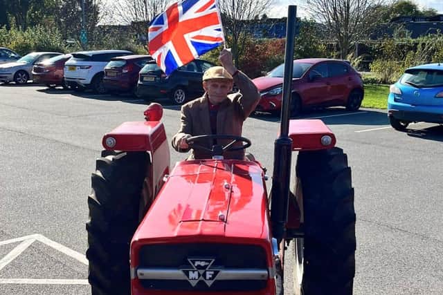 Colin on his favourite tractor.