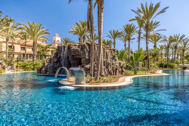 The 'lazy river' circular pool complete with waterfall