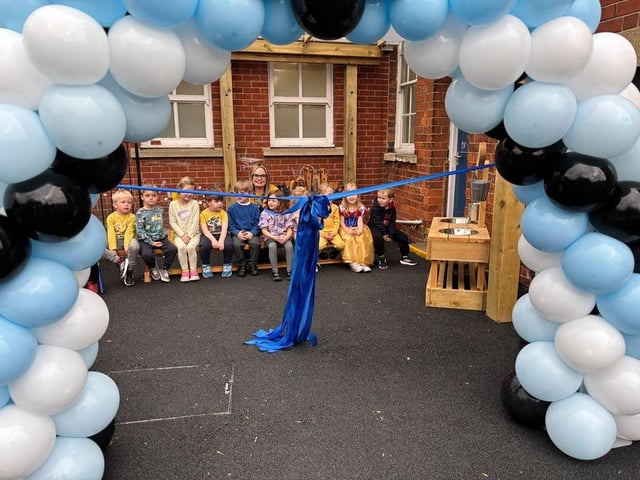 EYFS children with their teacher