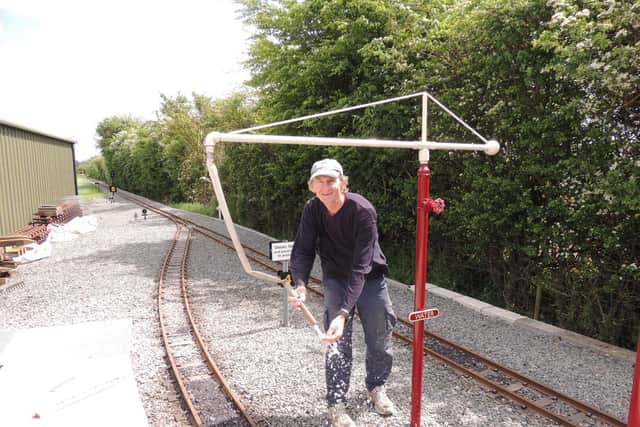 Testing the water supply for the steam engines. Robert Holland's good friend and loyal volunteer on the railway, Paul Davidson.