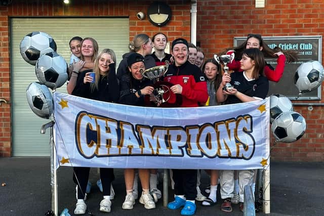 Louth FC U16 girls celebrate their tournament triumph in France.