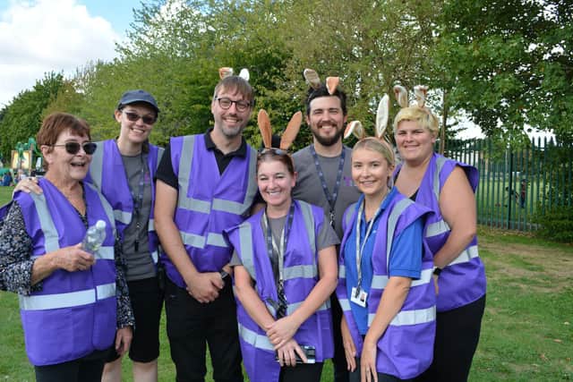 Craig Sanders, third from left, and the Trinity Arts team