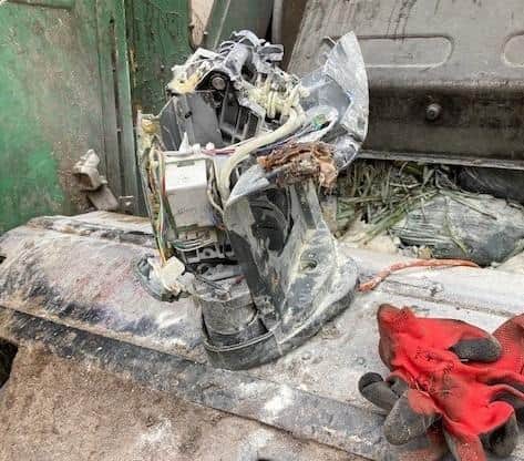 The remains of the burnt our appliance that was tipped in a dustbin lorry in Boston.