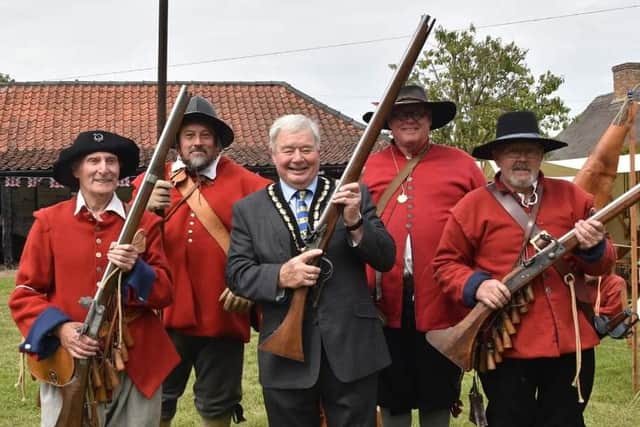 Mayor of Skegness Coun Pete Barry (centre) is armed and ready at the Civil War event at The Village Church Farm museum in Skegness