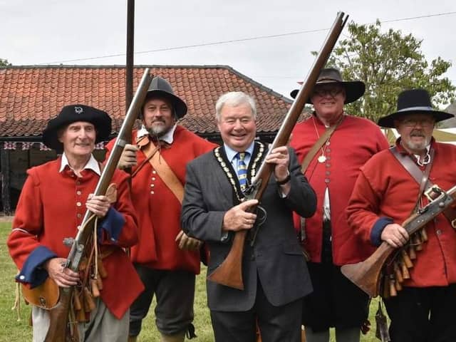 Mayor of Skegness Coun Pete Barry (centre) is armed and ready at the Civil War event at The Village Church Farm museum in Skegness