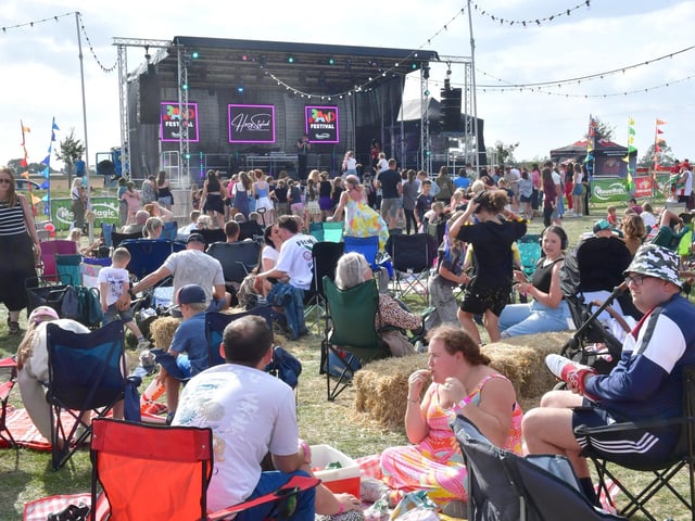 Hundreds of visitors relaxed in the sunshine in front of the music stage on each of the three days of the Rand Festival.