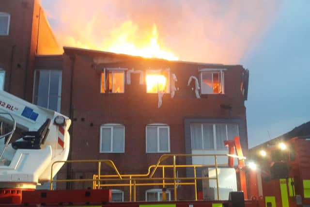Crews from around the county attended  four-storey building at Haven Village in Boston.