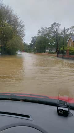 Ruskington High Street under water after the Beck overflowed in October 2023. Photo: Jacqui Dagg Ratcliffe