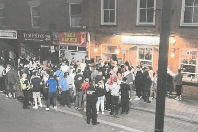 Police respond to a large crowd outside The Grapes pub, Southgate, Sleaford. From Lincolnshire Police's submission to North Kesteven District Council, asking for the pub's licence to be reviewed.