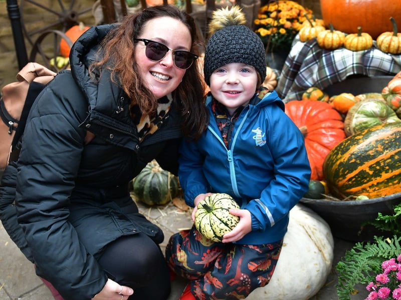 Emma and Jasper Hill, aged three, with some of the colourful pumpkins and squashes.