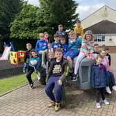 The children getting ready for a day on the farm