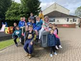 The children getting ready for a day on the farm