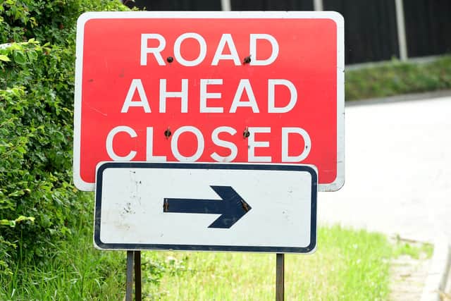 General view of a road ahead closed sign, London.
