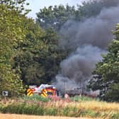 Emergency services at the scene of a bus fire on the A52 at Friskney.