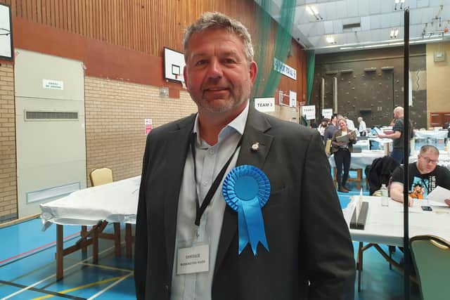 Relieved Conservative leader Coun Richard Wright bucked the trend for Tories in the county.
