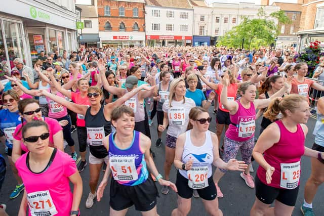 Participants in the women's Run for Life 2022 warming up.