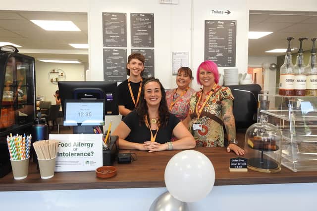 Some of the team at the cafe and hub.