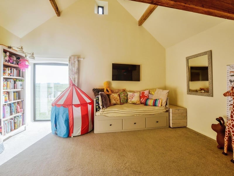 The bedroom at the end of the opposite wing.