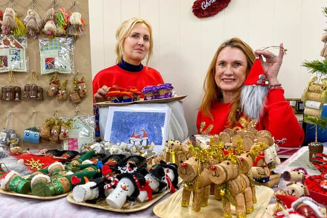 Tizzy Brooks and Julie Whiley with some of their cork based Christmas decorations.. Photos: Chris Frear