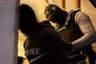 The arrest of a suspect at cannabis factory raid.