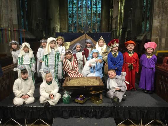 Heckington St Andrew's Primary School's Nativity by Reception and Year 6 children.