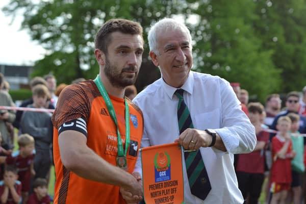 Richard Ford received a runners-up pennant after Boston Town lost their penalty shoot-out - photo (c) Joshua Hallam
