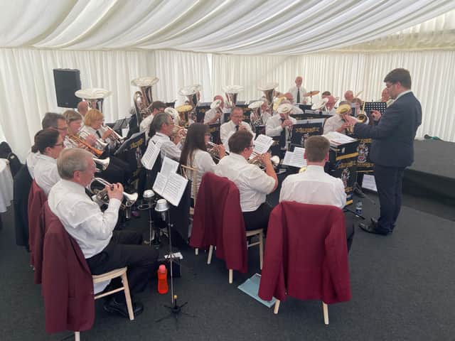 Alford Silver Band plays at the International Bomber Command Centre for the Royal British Legion Centenary.