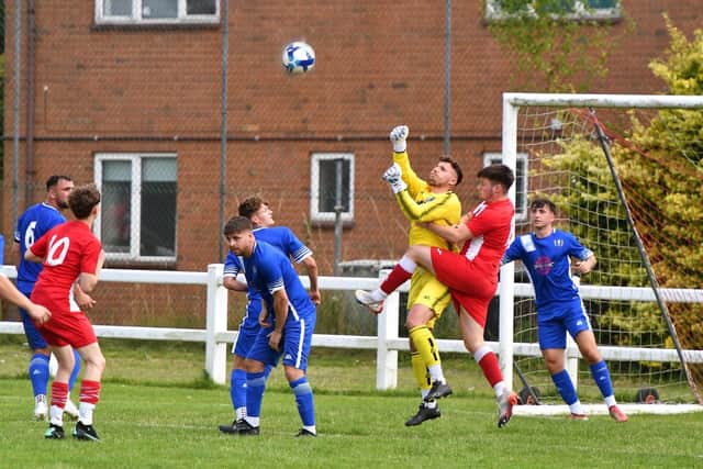Action from Horncastle's clash with Louth Town last weekend. Photo: Rob Savage.
