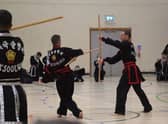 Action from the tournament. Scott Slack and Keith Slack.