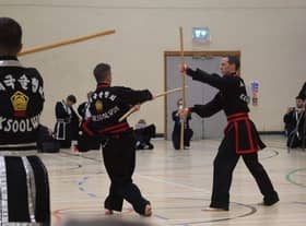 Action from the tournament. Scott Slack and Keith Slack.