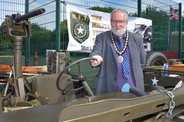 Mayor of Sleaford Coun. David Suiter Checks out a 1943 Ford Jeep.