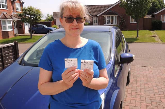 Anna Clark and her parking tickets which she offered as evidence in her appeal against the penalty charge.