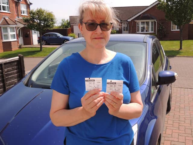 Anna Clark and her parking tickets which she offered as evidence in her appeal against the penalty charge.