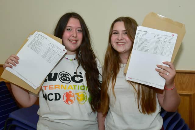 From left - Ruby Eaton, 16, Ruby Mason, 16, get their GCSE results at St George's Academy, Sleaford.