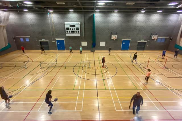 Pickleball players in action. Photo by Chris Frear