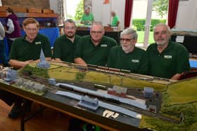 L-R Jim King - exhibition manager, Shaun Gill - chairman, Eddie King - treasurer, Colin Houseman - secretary, and William Elkington - membership secretary of NG34 Model Railway Society.