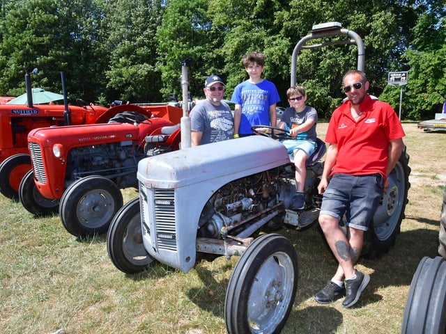Stuart Duffield, Connor Duffield, 11, and Charlie Duffield, 9, of Alford, with Adam Smith of Skegness and his 1956 Ferguson tractor.