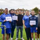 Swineshead Institute coaches and players limber up for Movember. Photo: Holly Parkinson