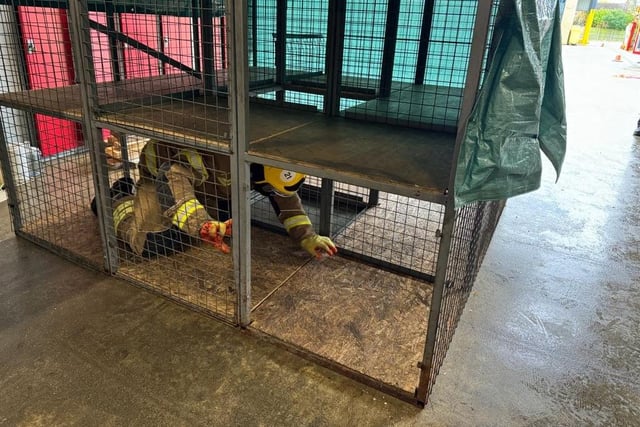 Recreating crawling through a confined space in a darkened room. Photo: Holly Parkinson