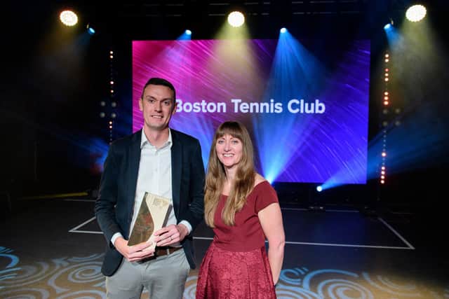Will Mason collects the Inclusion & Diversity Award for Boston Tennis Club, presented by Michelle McGill from sponsor England Golf