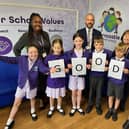 Celebrating Horncastle Primary School's Good Ofsted, from left back: SENCO and inclusion lead Shecaniah Morgan, headteacher Andy Cook, and safeguarding lead Eiry Leak.Front: Freya Leesing, 8, Jada Ross, 8, Hattie Todd, 8, George Mowbray, 8, James Rawdon, 8 and Theo Allen, 8.