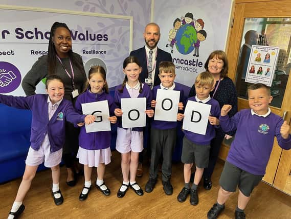 Celebrating Horncastle Primary School's Good Ofsted, from left back: SENCO and inclusion lead Shecaniah Morgan, headteacher Andy Cook, and safeguarding lead Eiry Leak.Front: Freya Leesing, 8, Jada Ross, 8, Hattie Todd, 8, George Mowbray, 8, James Rawdon, 8 and Theo Allen, 8.