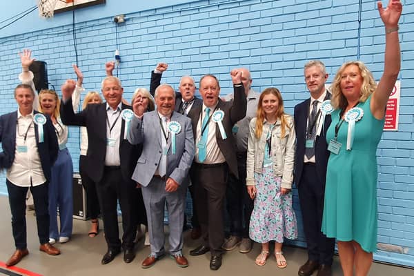 Reform candidates and supporters celebrate taking four of the 11 county council seats in North Kesteven. The Tories hung onto six there and Lincolnshire Independents one.